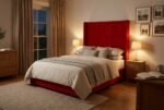 The Commander Headboard in bright red in a warm evening bedroom