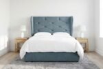 The Diamond Headboard in slate blue in a bright modern bedroom