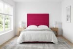 The Florence Headboard in fuchsia pink in a bright modern bedroom