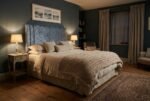 The Flow Headboard in silver blue in a warm evening bedroom