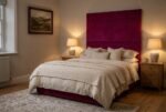 The Iris Headboard in magenta in a warm evening bedroom