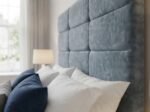Close-up of the Linear Block Headboard fabric and padded detail