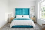 The Rembrandt Headboard in bright turquoise in a bright modern bedroom