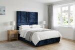 The Rome Headboard in navy blue in a bright modern bedroom