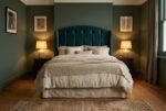 The Ruby Headboard in dark teal in a warm evening bedroom